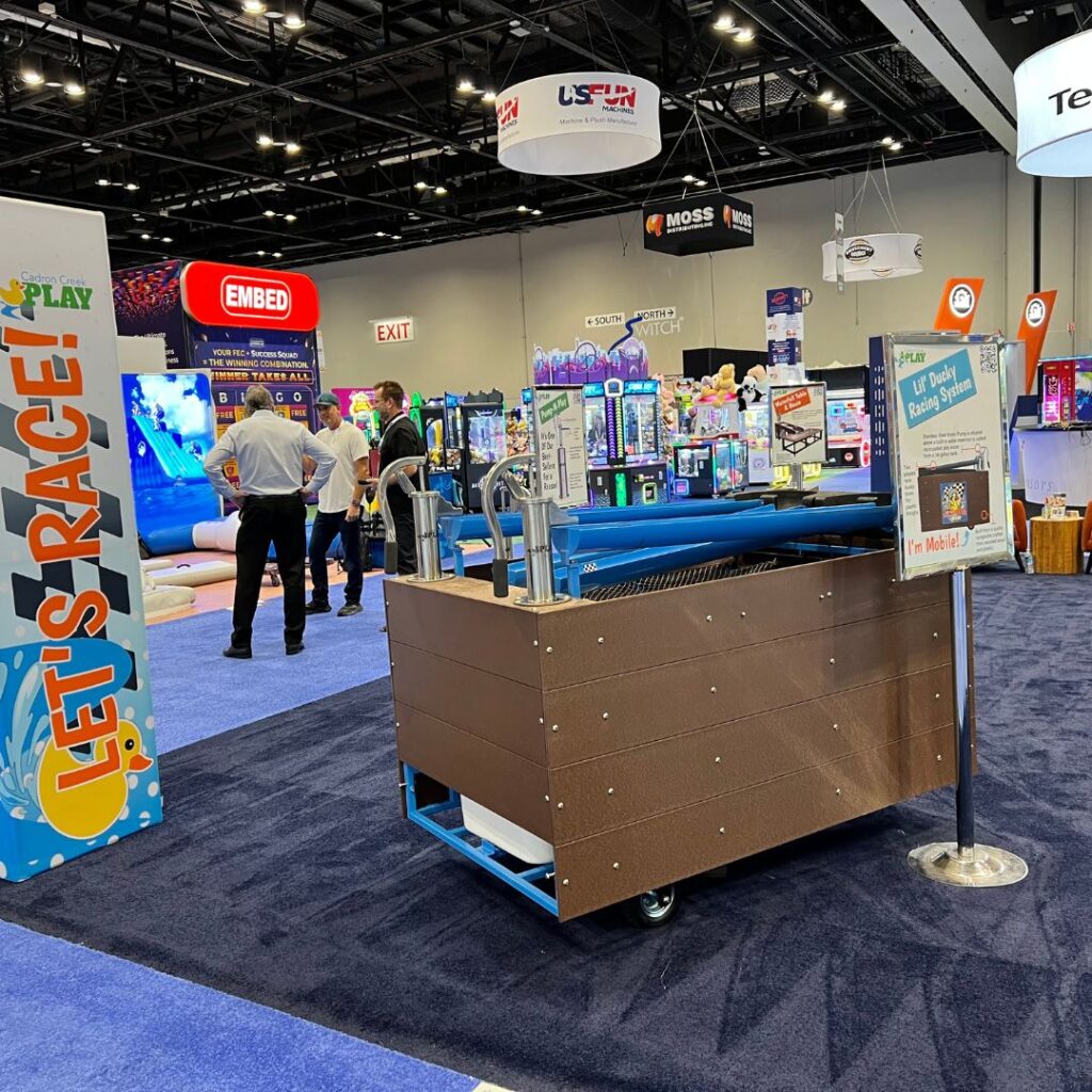 Cadron Creek Play's Booth setup at IAPPA featuring the Lil Ducky Racing System
