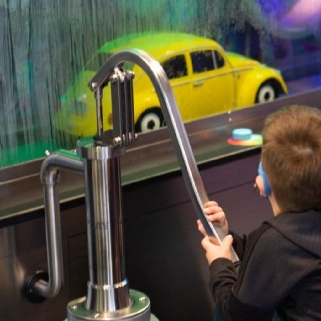 Pump-n-Play system used in the Buffalo Children’s Museum outdoor car wash exhibit for kids